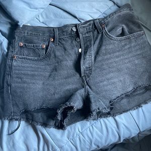 Levi’s distressed black jean shorts